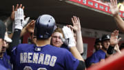 Reds lose 9th straight, Arenado leads Rockies to 5-4 win