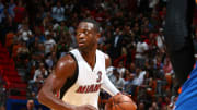 Wade's 28 lifts Miami over OKC in wild game, 97-95