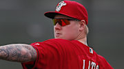 Reds' Mat Latos (knee surgery) won't be ready for season's start