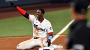 Fan Runs on Field, Marlins Run Past Phillies in Opener