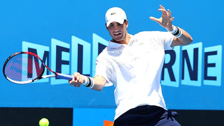 American John Isner retires from the Australian Open with an ankle injury