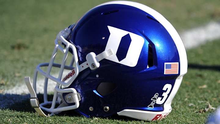 Duke grad assistant gets football team excited by smashing a chair