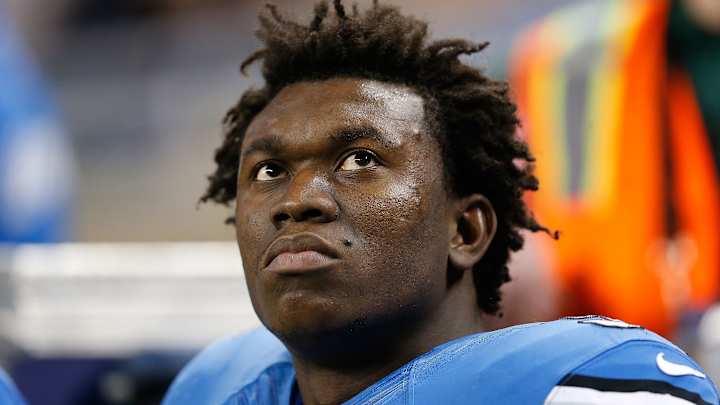 Lions DE Ziggy Ansah offers to donate a trombone to a homeless man