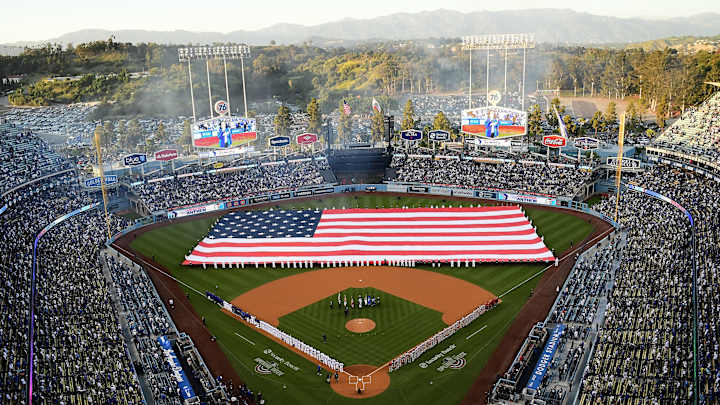 Dodgers: Superstar Rapper Sits In Outfield With LA Diehard Fans