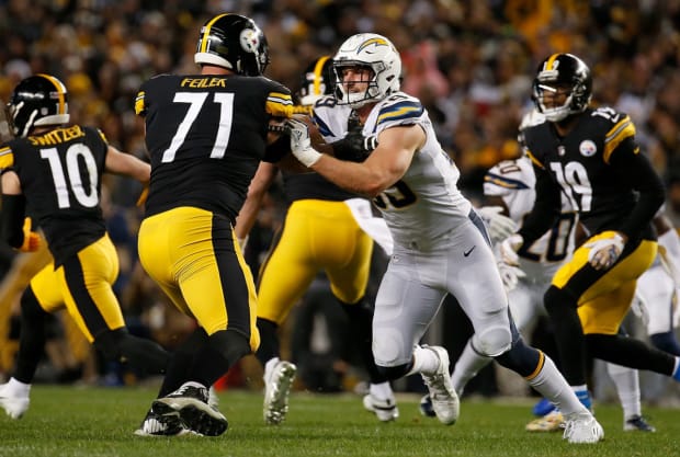 LOOK: Baker Mayfield headbutts another teammate without a helmet during  Rams' wild comeback win over Raiders 