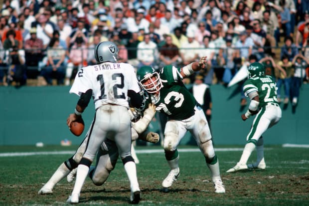 San Francisco 49ers Ronnie Lott pulls down Seattle Seahawks receiver Steve  Largent (80) for a short