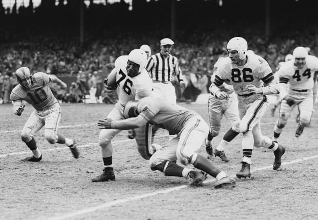 Buffalo Bills at Cleveland (Marion Motley carrying ball) AAFC