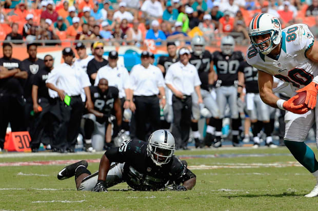 Tim Hasselbeck blames Cowboys' passing miscues in loss, Dolphins