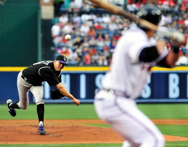 Chicago White Sox pitcher Mark Buehrle kicks the dirt as Cleveland Indians'  Jhonny Peralta rounds the bases after hitting a two-run home run in the  third inning of baseball action, Tuesday, May