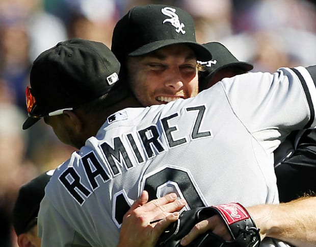 Chicago White Sox pitcher Mark Buehrle kicks the dirt as Cleveland