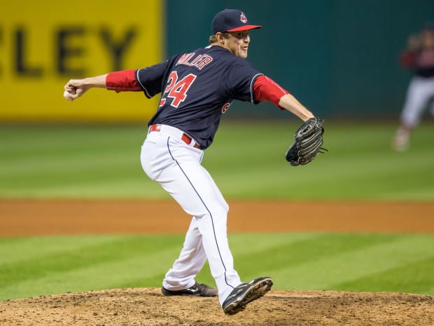 Cleveland Indians pitcher Andrew Miller throws to the Minnesota