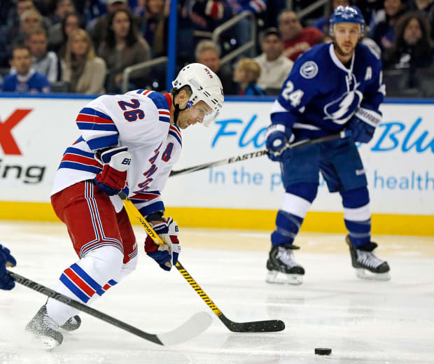 Steve Yzerman pays price, trades Martin St. Louis to New York