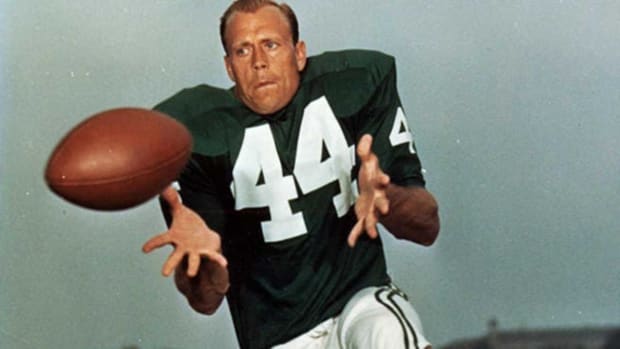 Tommy McDonald, who was part of the 1960 Eagles squad, celebrates as he was  introduced during a halftime ceremony as the Philadelphia Eagles play the  Green Bay Packers at Lincoln Financial Field