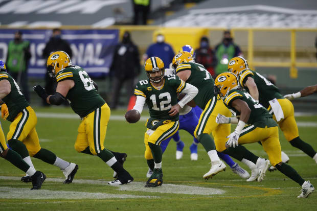 Detroit Lions cornerback Milton Mack grabs the jersey of Green Bay News  Photo - Getty Images