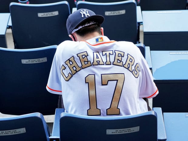 New York Yankees fans bring inflatable trash cans, costumes and