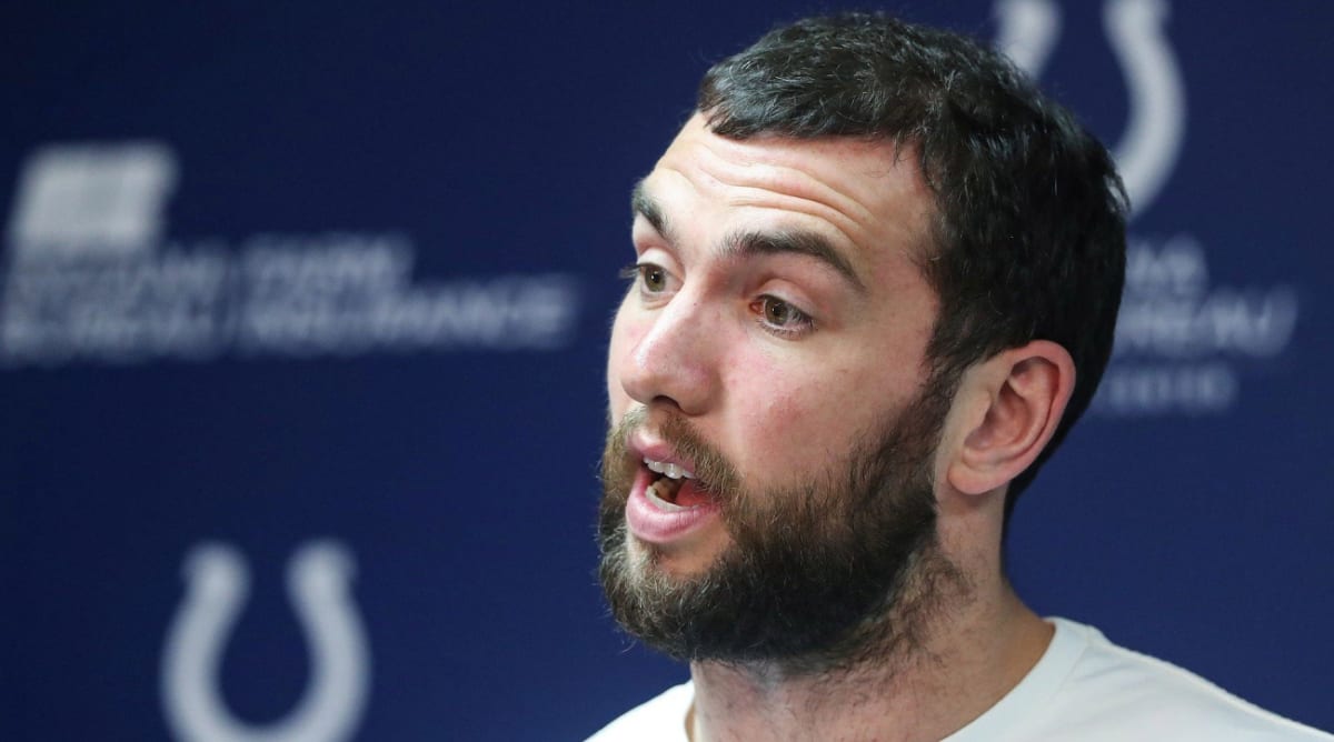 andrew luck wearing pink