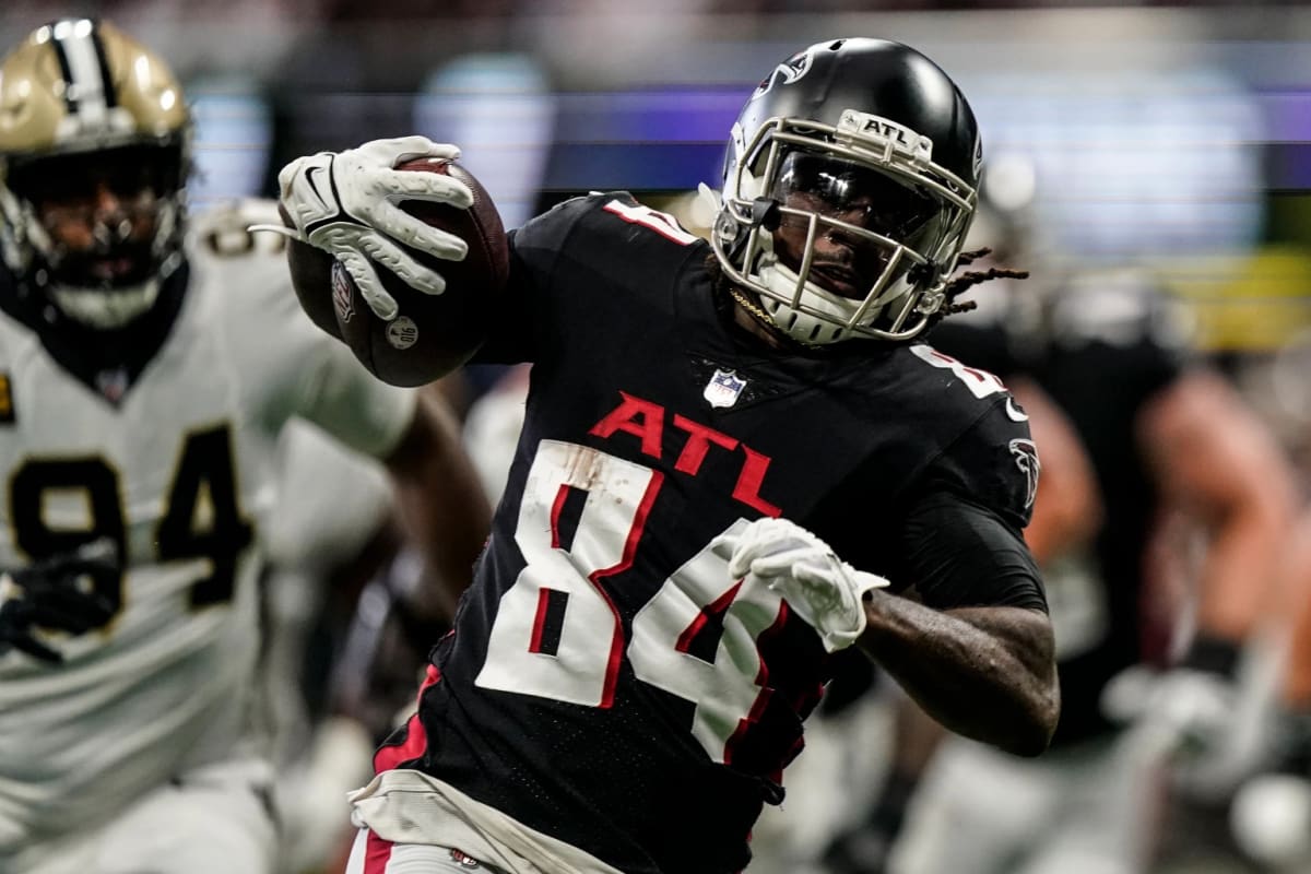 Cordarrelle Patterson of the Atlanta Falcons holds a sign from a