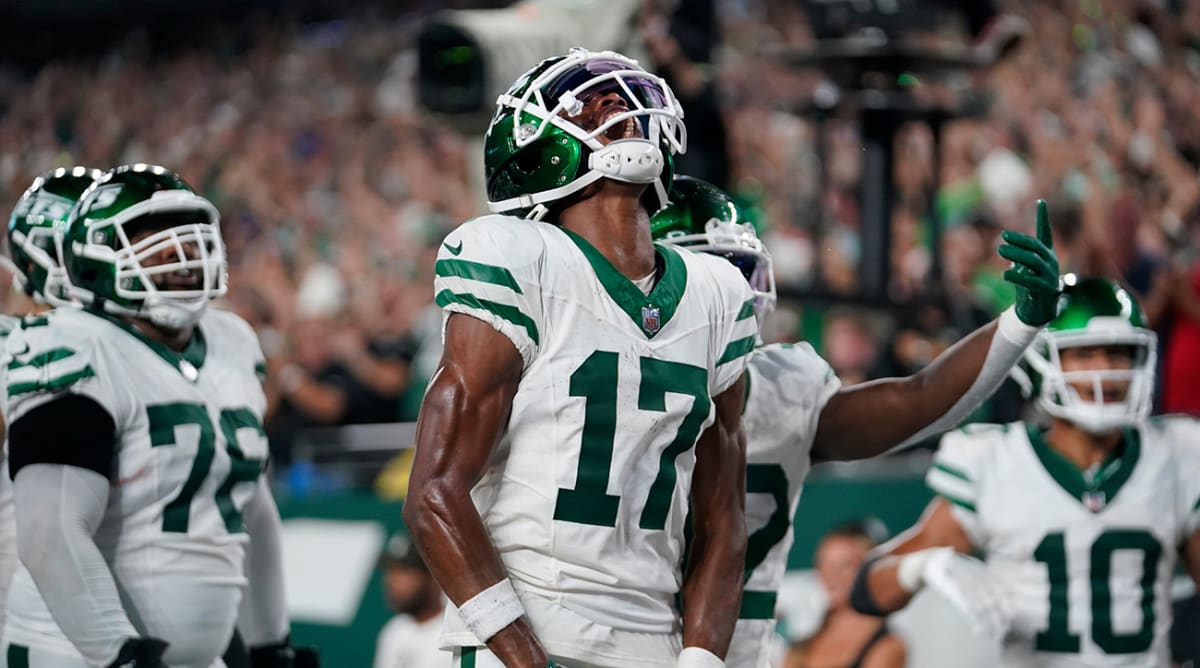 New York Jets wide receiver Garrett Wilson (17) reacts after