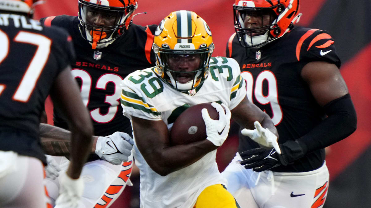 Green Bay Packers' Tyler Goodson runs during the first half of a