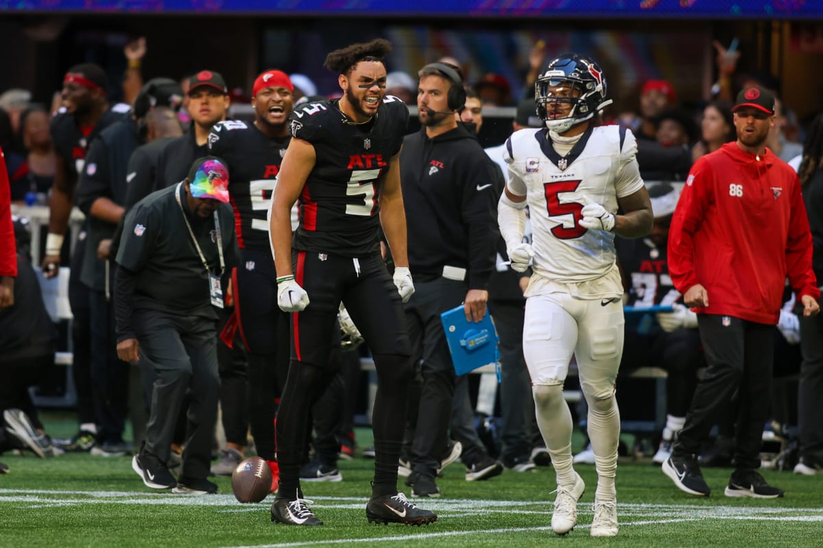 Houston Texans wide receiver Tank Dell runs after a catch against