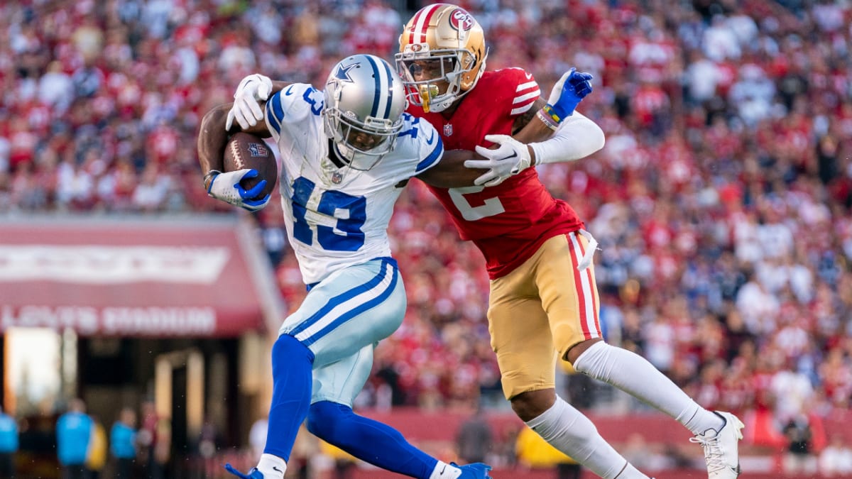 San Francisco 49ers cornerback Deommodore Lenoir, top, tackles Las