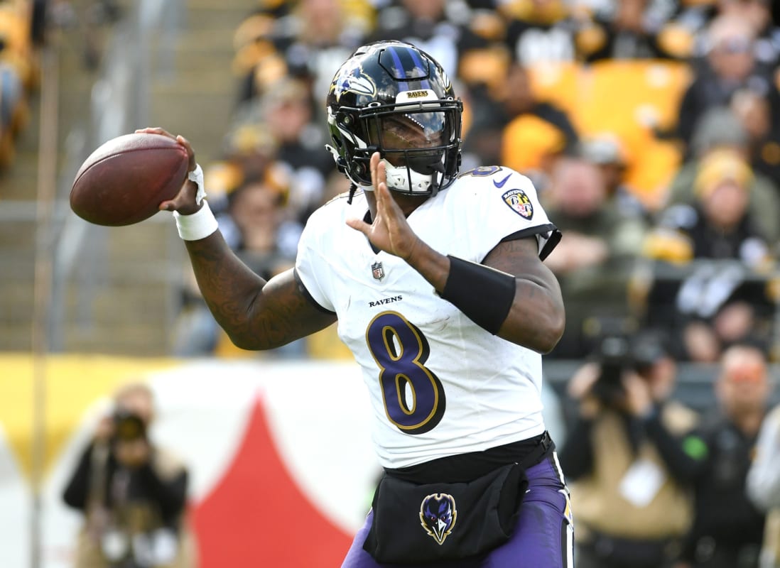 Lamar Jackson's No. 8 jersey retired at packed Cardinal Stadium