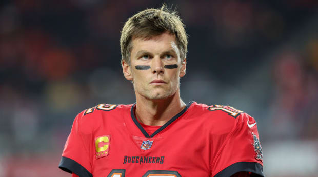 Sports Illustrated - Joe Burrow: A more mobile Tom Brady? 