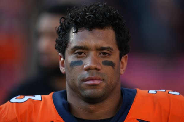 Broncos Country, let's slide!: Russell Wilson works out ahead of year two