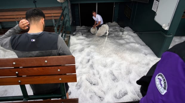 Rockies dugout filled with 'almost two feet' of hail before game