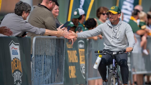 ESPN radio host Ben Brust has Matt LaFleur sign Rodgers Jets jersey