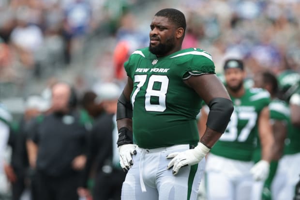 New York Jets' Starting Guards Absent in Joint Practice with Tampa