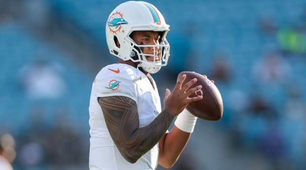 Tua Tagovailoa: Miami Dolphins officially exercise quarterback's fifth-year  option