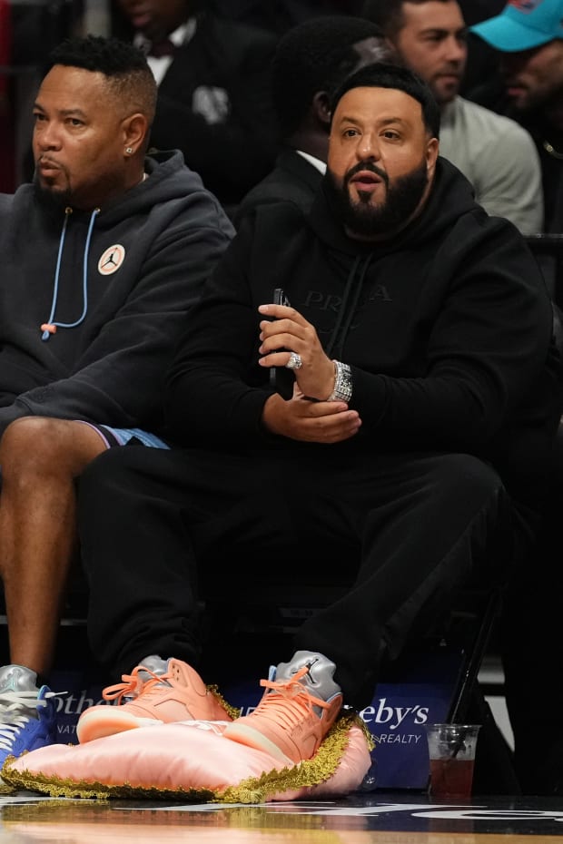 DJ Khaled Puts his Air Jordan Sneakers on Pillow at NBA Game