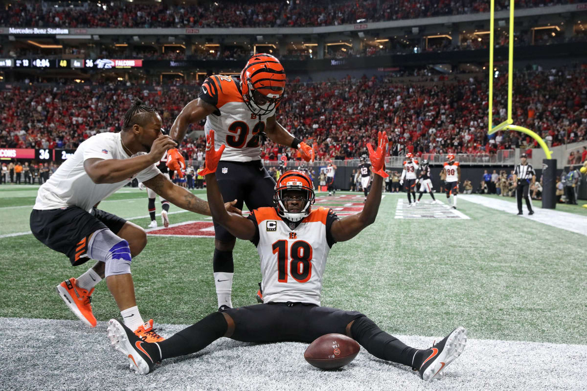 Cincinnati Bengals' wide receiver A. J. Green, 18, who is recovering from  an injury, attends an NFL practice session at the Allianz Park stadium in  north London, Friday, Oct. 25, 2019. The