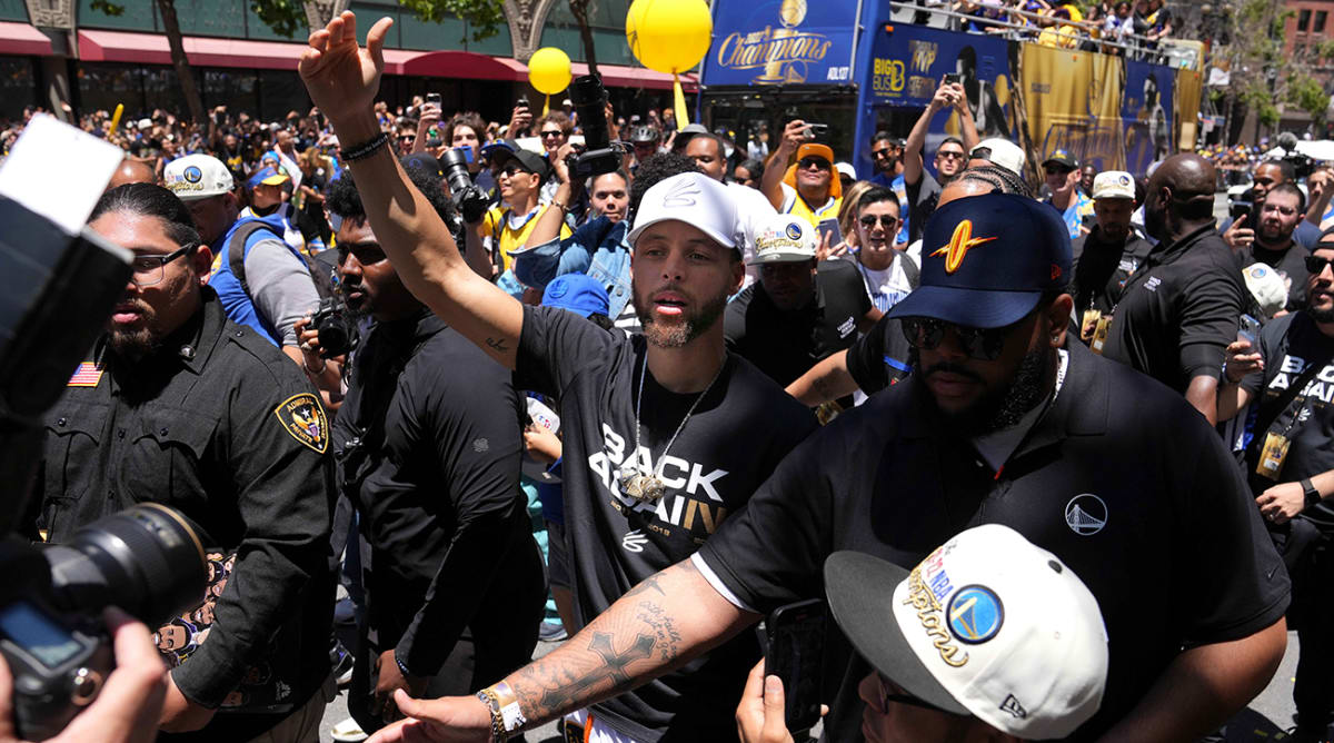 Steph Curry Shakes Off Awkward Moment With Fan During Warriors Parade