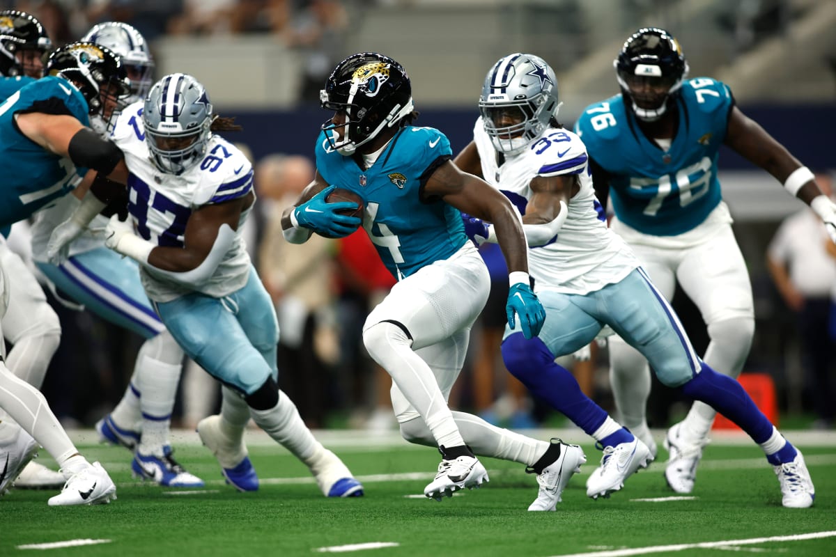 Jacksonville Jaguars running back Tank Bigsby runs with the ball prior to  an NFL Football game in Arlington, Texas, Saturday, August 12, 2023. (AP  Photo/Michael Ainsworth Stock Photo - Alamy