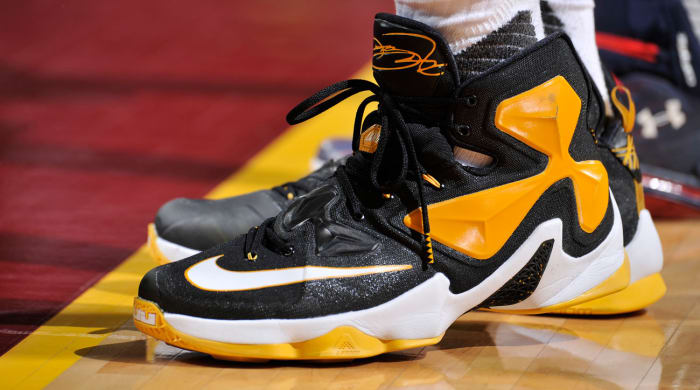 lebron james black and yellow shoes