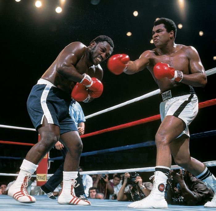 25 Years Later Ali And Frazier Are Still Slugging It Out Sports