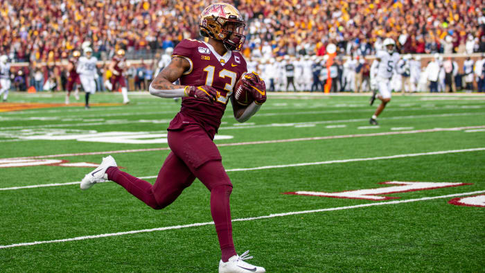 Rashad Bateman scores a touchdown against Penn State.