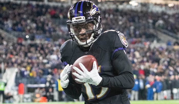 Baltimore Ravens wide receiver Marquise Brown (15) catches a pass for a touchdown during the third quarter against the New York Jets at M&T Bank Stadium.