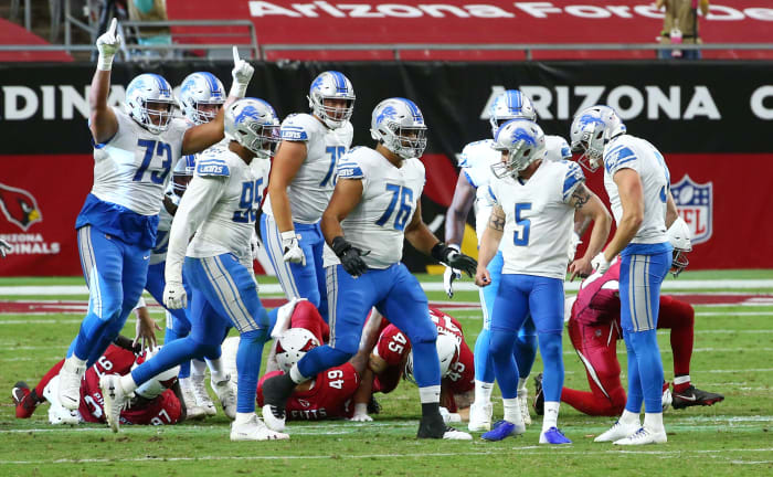 Detroit Lions kicker Matt Prater (5) celebrates his game winning field goal against the Arizona Cardinals with no time left on the clock at State Farm Stadium.