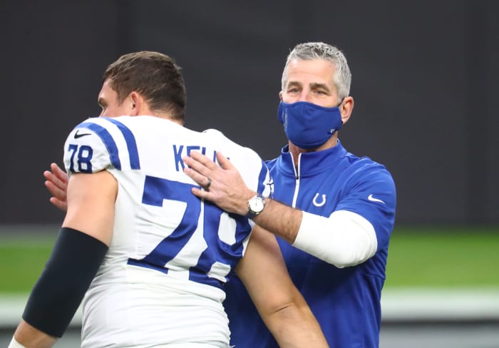 Indianapolis Colts head coach Frank Reich pats center Ryan Kelly on the back in Las Vegas.