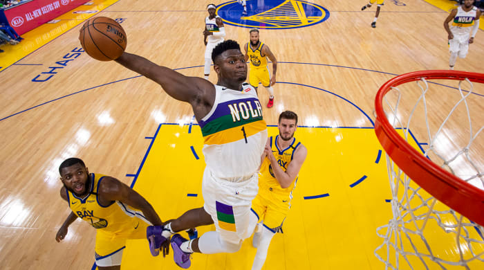 Zion Williamson dunking against the Warriors.