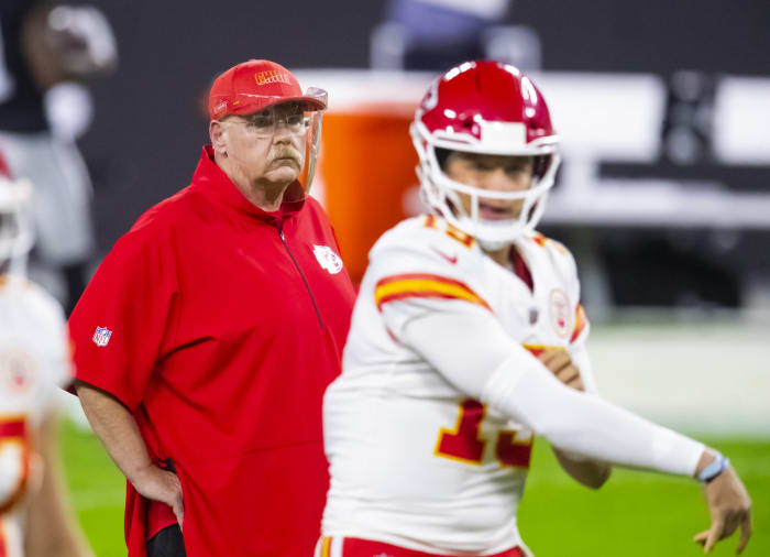 Kansas City Chiefs head coach Andy Reid watches quarterback Patrick Mahomes (15) against the Las Vegas Raiders at Allegiant Stadium.