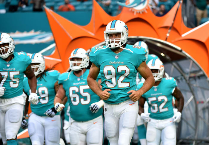 Longtime Dolphins snapper Denney not ready to retire - Sports ...