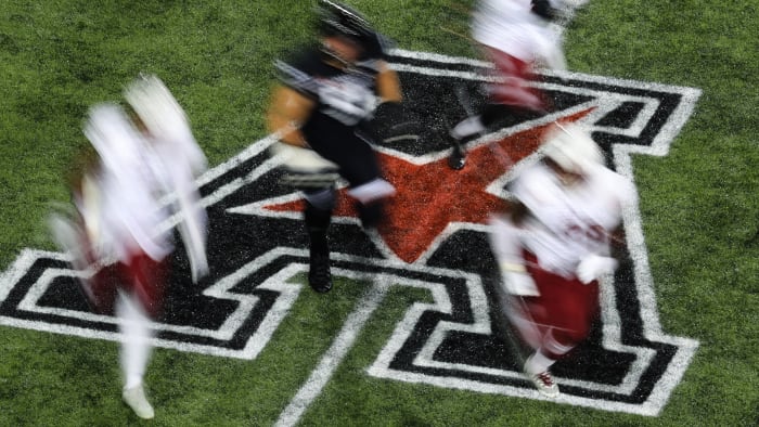 AAC football logo on the field