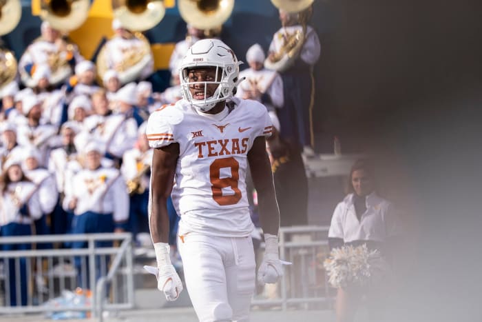 Texas wide receiver Xavier Worthy (8) smiles after scoring a touchdown during the game against West Virginia on Saturday, Nov. 20, 2021. Mlc Ut Wv Football 1106