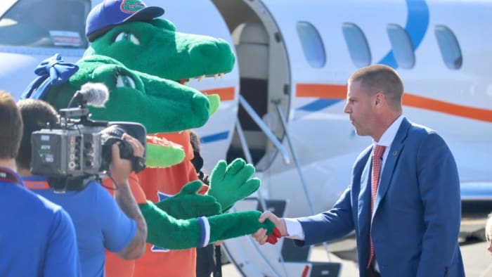 Napier greets Albert and Alberta on the runway at Gainesville Regional Airport. Photo: Billy Napier; Photo credit: Zach Goodall