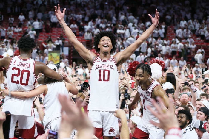 Arkansas Razorbacks forward Jaylin Williams (10) celebrates with teammates after the game against the Auburn Tigers at Bud Walton Arena. Arkansas won 80-76.