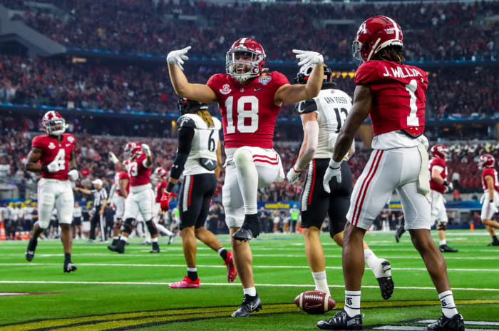 Alabama Crimson Tide wide receiver Slade Bolden (18) celebrates after scoring a touchdown against the Cincinnati Bearcats during the first quarter in the 2021 Cotton Bowl college football CFP national semifinal game at AT&T Stadium